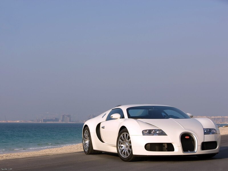 White Bugatti Veyron on beach