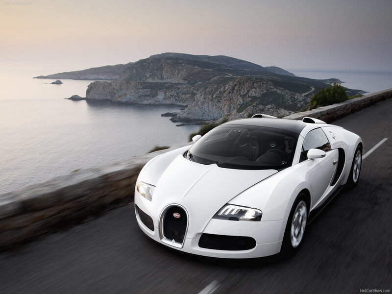 White Bugatti Veyron on coastal road