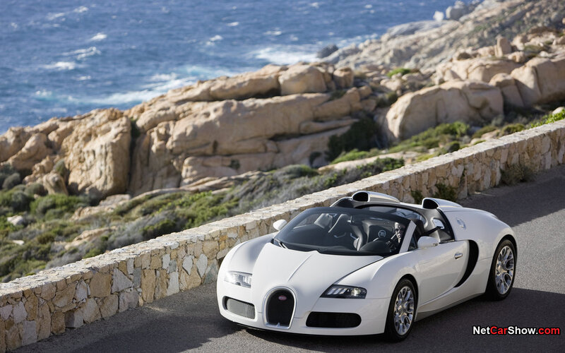 White Bugatti Veyron on coastal road