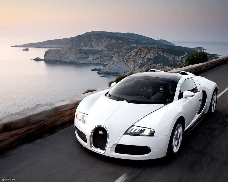 White Bugatti Veyron on coastal road