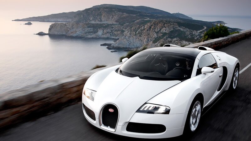 White Bugatti Veyron on coastal road