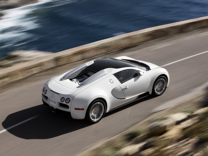 White Bugatti Veyron on coastal road