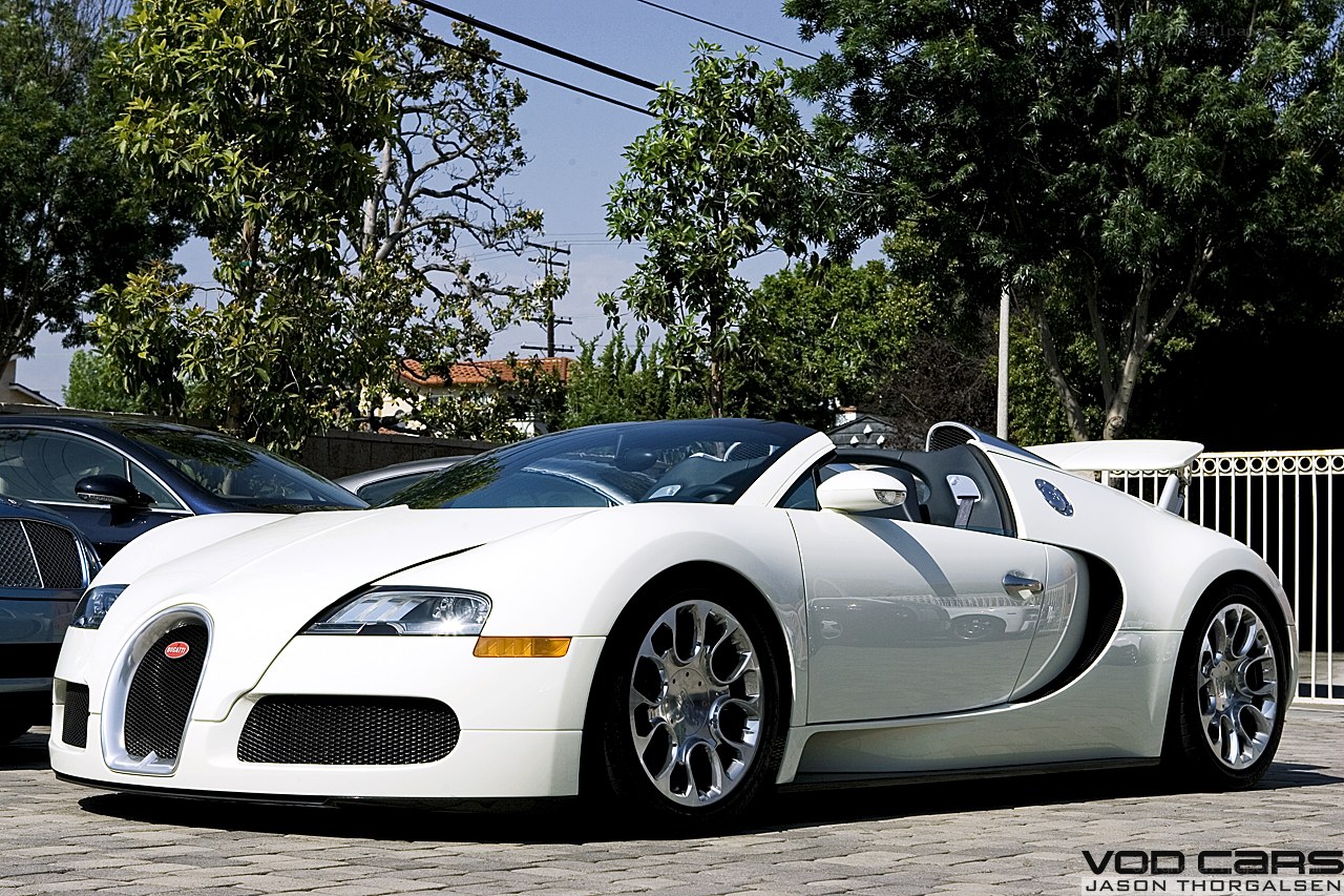 White Bugatti Veyron parked outside
