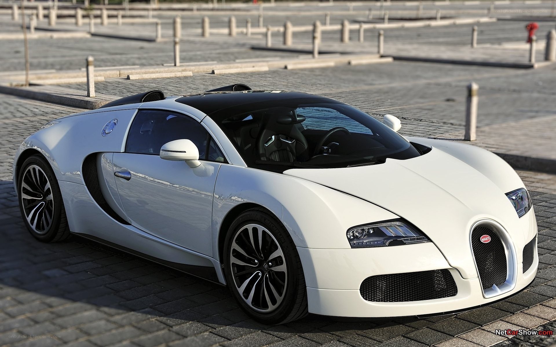 white bugatti veyron parked