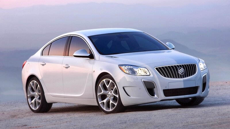 white buick sedan on gravel