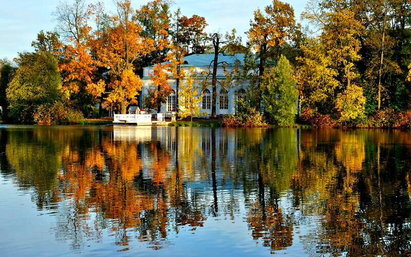 White Building by Lake — Blue