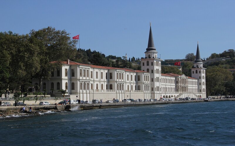 White Building by Water — Blue