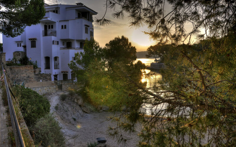 White Building by Water — Green
