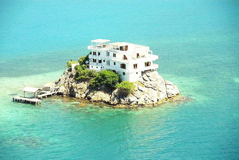White Building on Rock — Blue