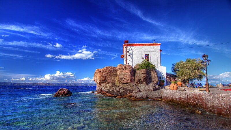 White Building on Rocks