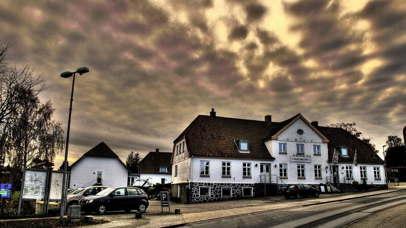 White Building under Cloudy Sky