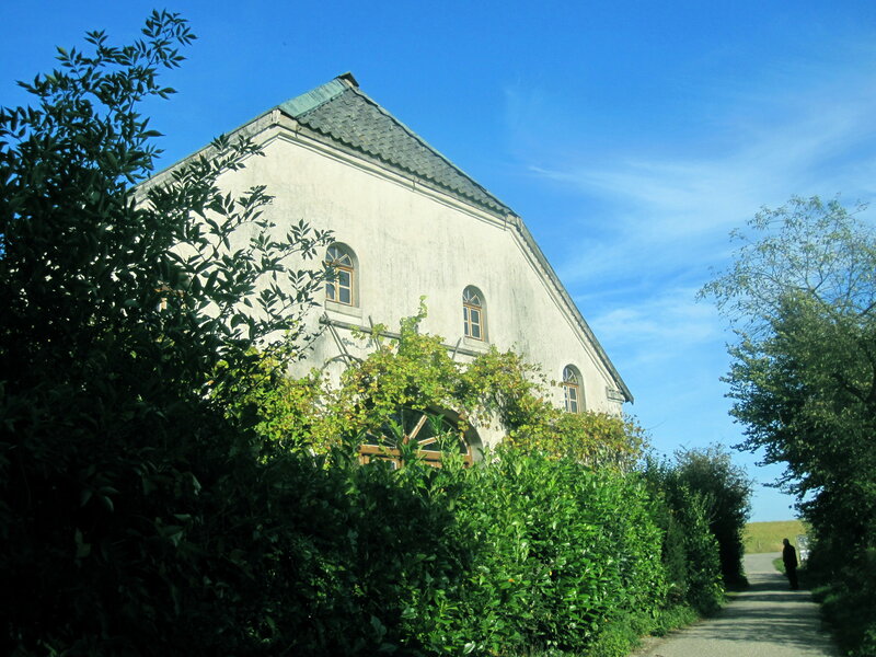 White Building with Arched Windows