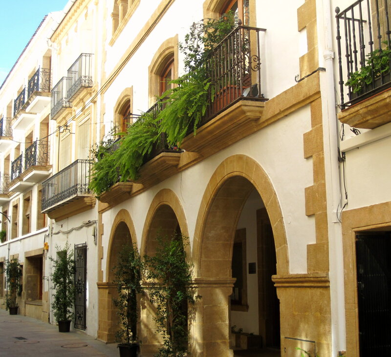White Building with Arches — Serene, Afternoon