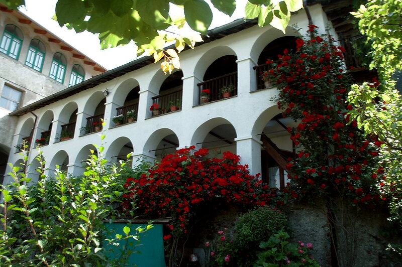 White Building with Arches — Serene