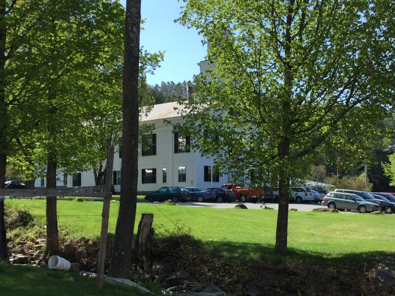 White Building with Cars
