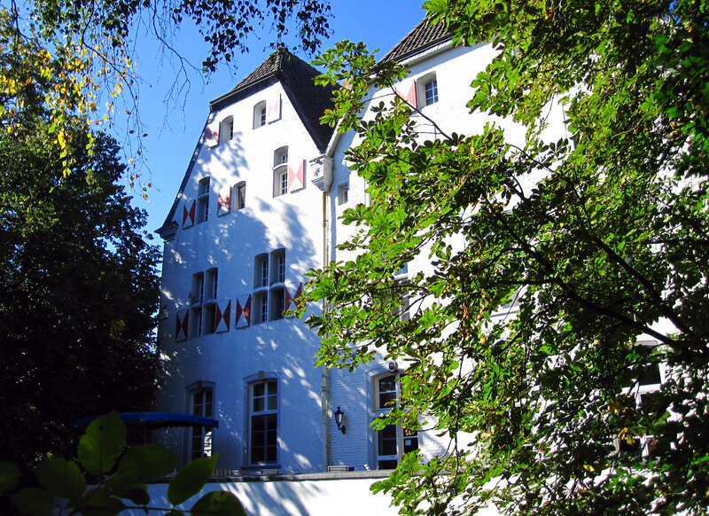 White Building with Flags