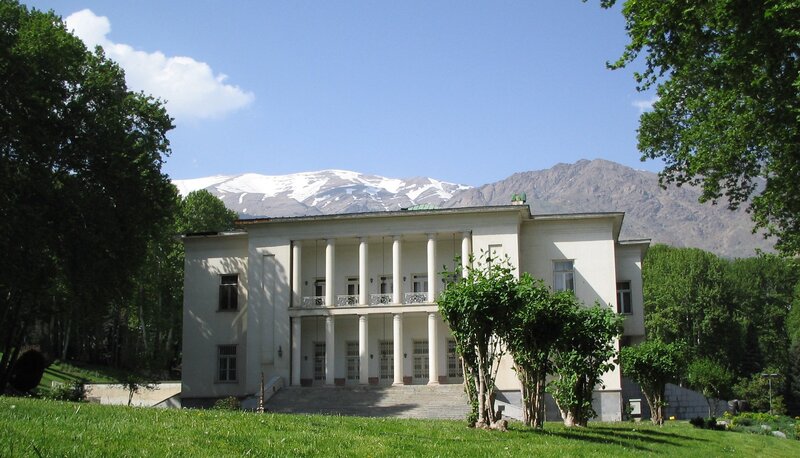 White building with mountain view