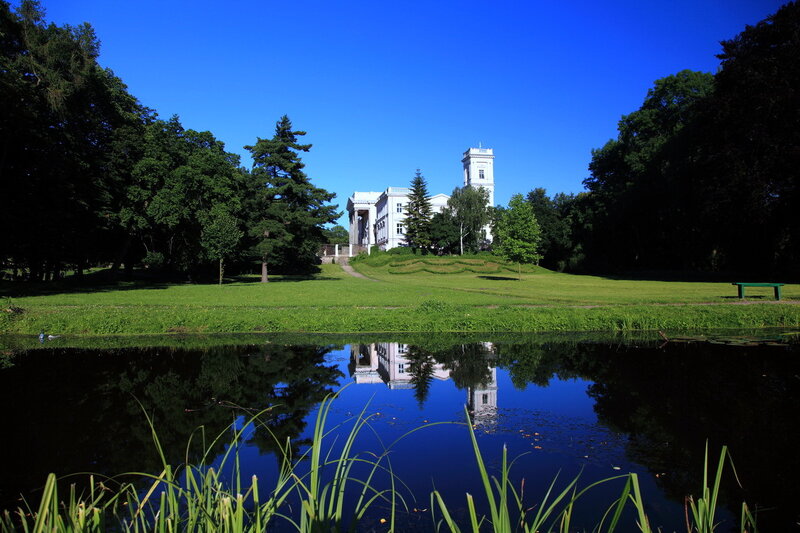 White Building with Pond