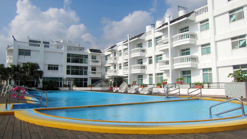 White Building with Pool — Blue, Serene