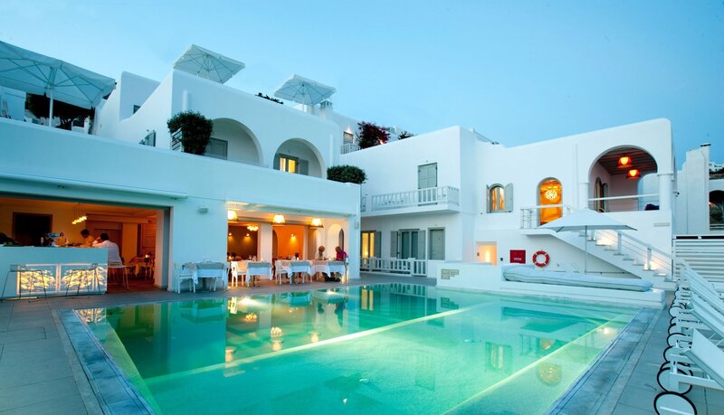 White Building with Pool — Serene, Sunset