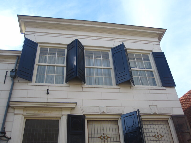 White Building with Shutters