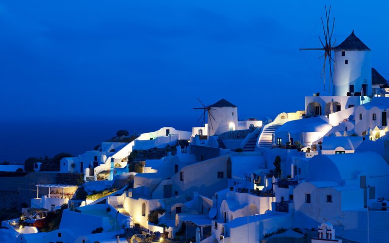White buildings at dusk in Santorini