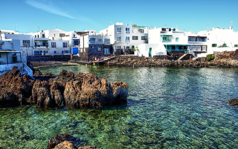 White Buildings by Sea — Blue, Serene