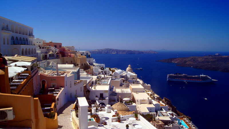 White Buildings on Cliff — Blue, Serene, Afternoon, Photograph, Cruise Ship