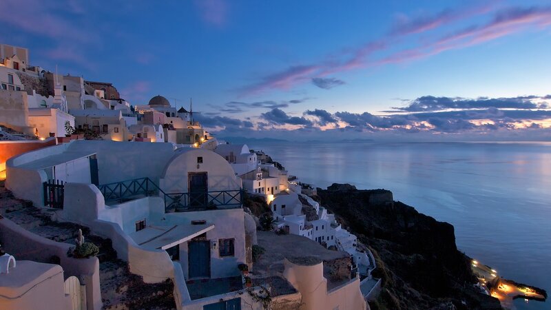 White Buildings on Cliff — Blue, Serene, Sunset, Photograph, Sea, Sky, Clouds, Black