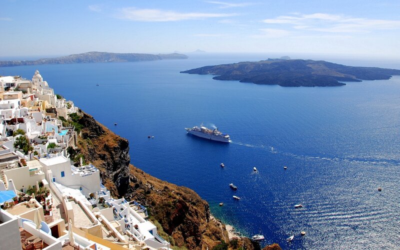 White Buildings on Cliff — Blue