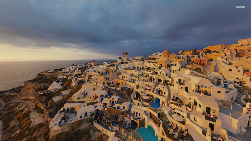 White Buildings on Cliff — Dramatic, Sunset
