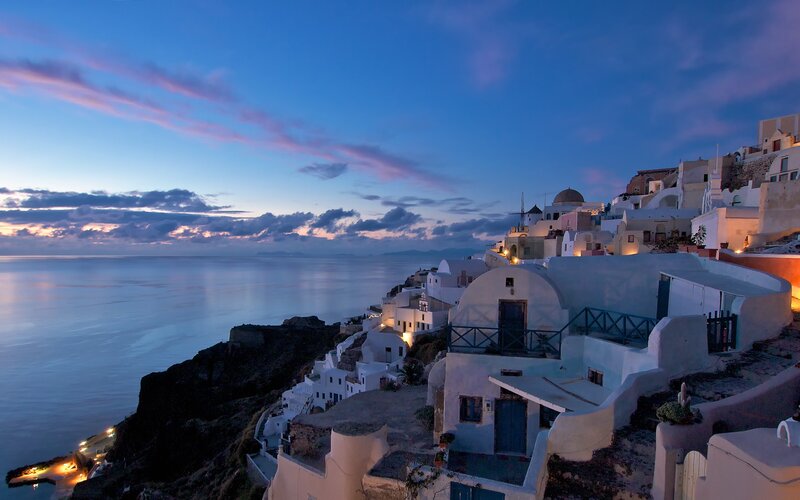 White Buildings on Cliff — Sea