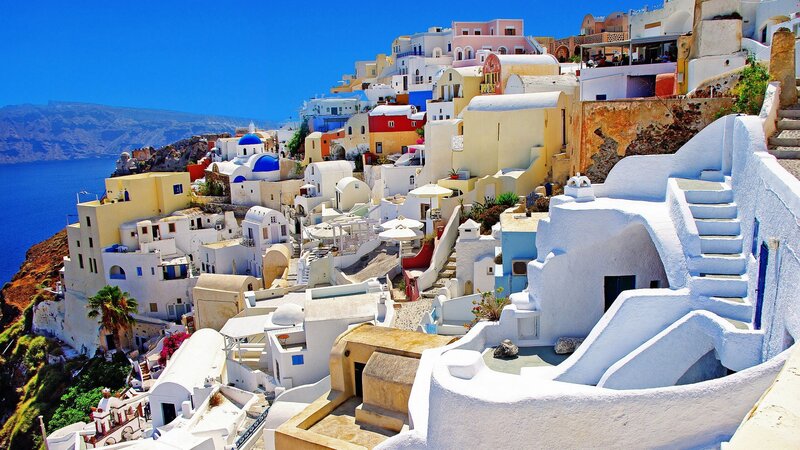 White Buildings on Cliff — Serene, Afternoon, Photograph, Blue Domes, Ocean