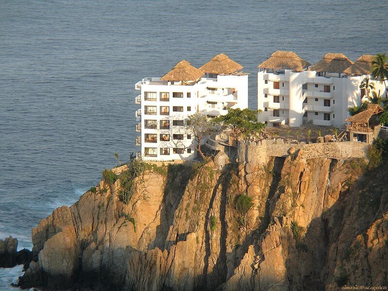 White Buildings on Cliff — Serene, Afternoon