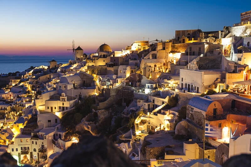 White Buildings on Cliff — Serene, Sunset, Photograph, Windmill