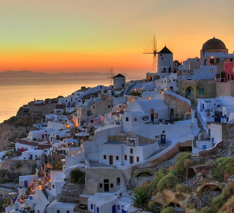 White Buildings on Cliff — Serene, Sunset, Photograph, Windmills, Sea, Dome