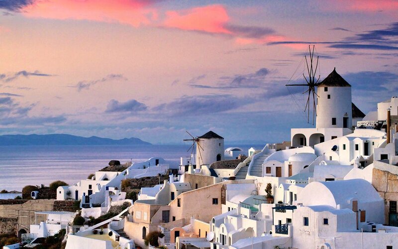 White Buildings on Hillside — Serene, Sunset