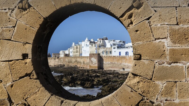 White Buildings Through Arch