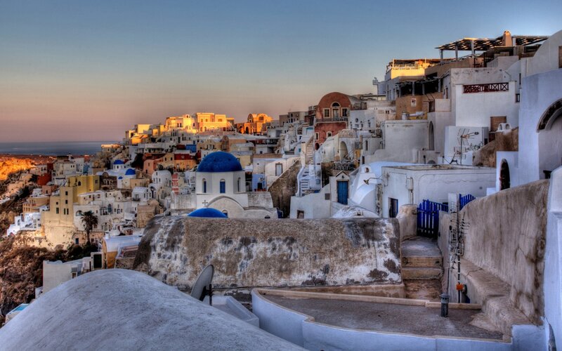 White Buildings with Blue Domes — Serene, Sunset