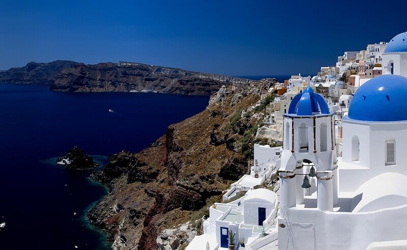White Buildings with Blue Domes — Serene