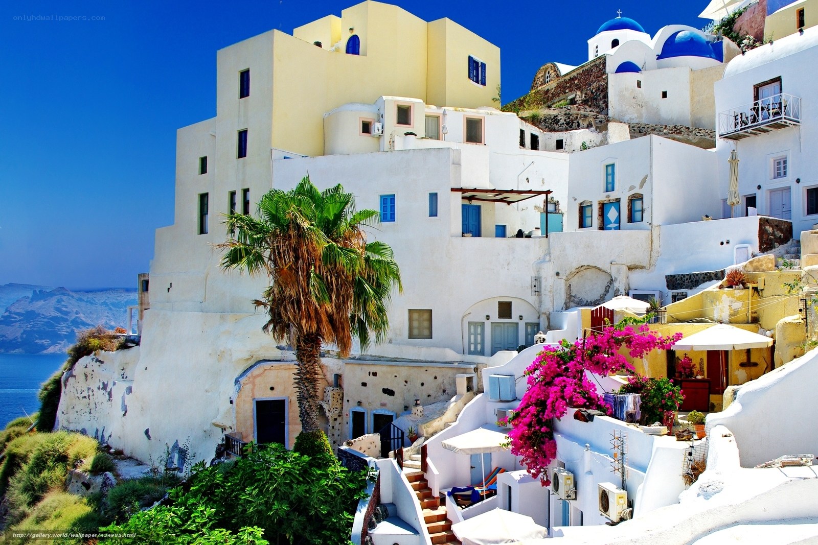 White buildings with blue domes