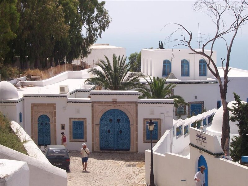 White buildings with blue doors