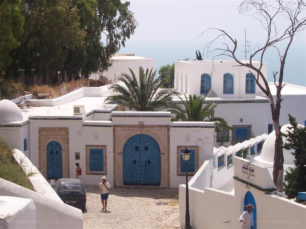 White buildings with blue doors