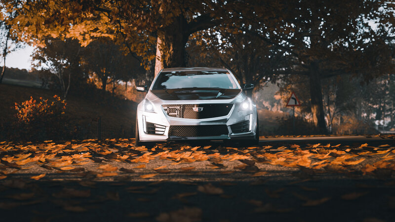 White Cadillac Car — Orange
