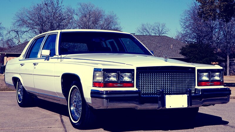 White Cadillac Sedan — Calm, Afternoon, Photograph, Car, House