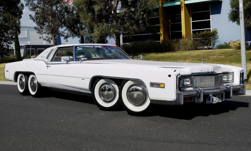White Cadillac Sedan — Calm, Afternoon, Photograph, Car