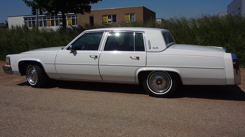 White Cadillac Sedan — Calm, Afternoon