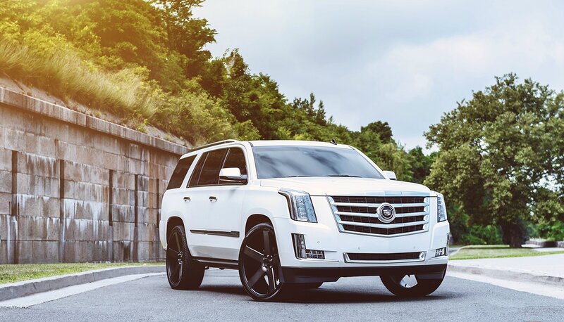 White Cadillac Suv — Dramatic, Afternoon