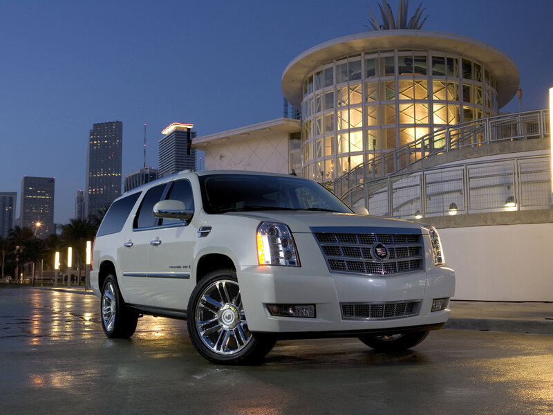White Cadillac Suv — Dramatic, Night, Photograph, Building