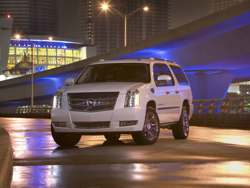 White Cadillac Suv — Dramatic
